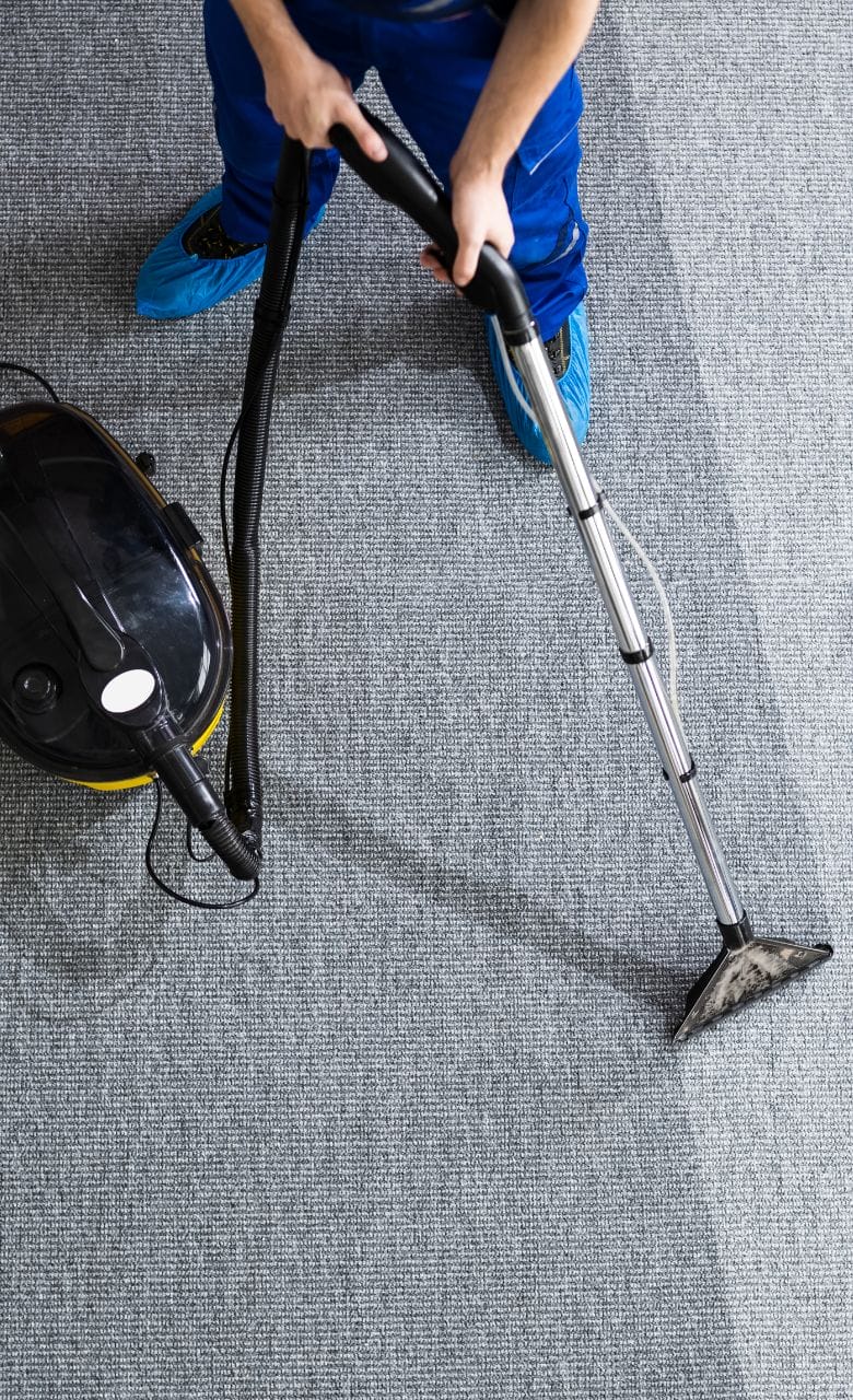 Cleaning Carpet With Vacuum Cleaner